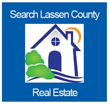 A blue square with the words search lassen county real estate written underneath it.